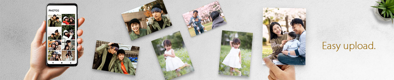 Online photo printing samples displayed on a wall