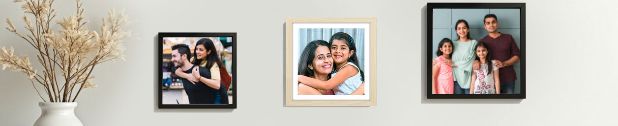 Assorted sizes of photo frames for wall in a collage display, perfect for a unique photo frame online arrangement.
