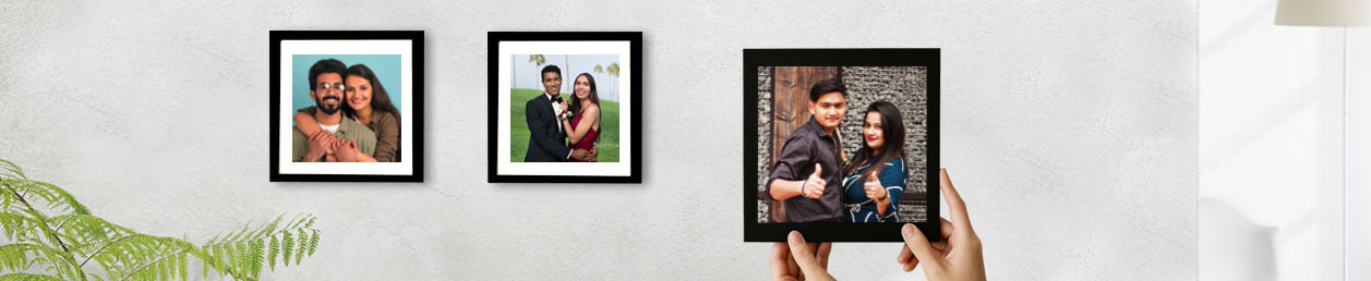 Happy family portrait in wall photo frames, beautifully designed with a birthday photo frame design online option.