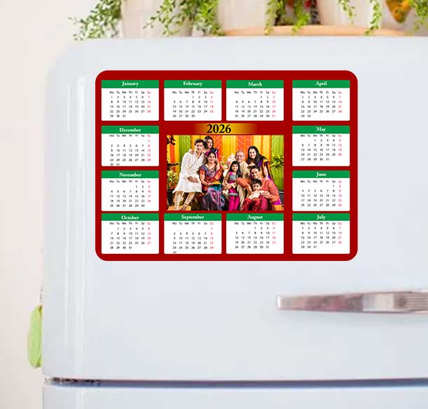 A colorful magnetic calendar with family photos for 2025, displayed on a fridge 