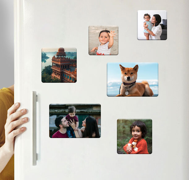 Custom photo magnets on a fridge featuring a dog photo, personalised with rounded corners and a matte finish.