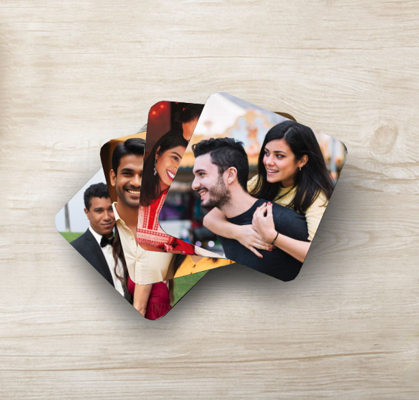 Custom photo fridge magnets featuring a couple, with vibrant colours and rounded edges for a professional finish.